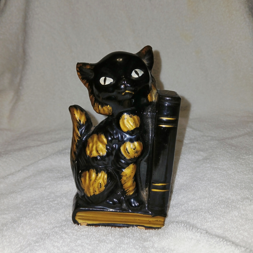 Black and Gold Cat Figurine with Book And Pen Holder. 6" Tall 3" Wide.